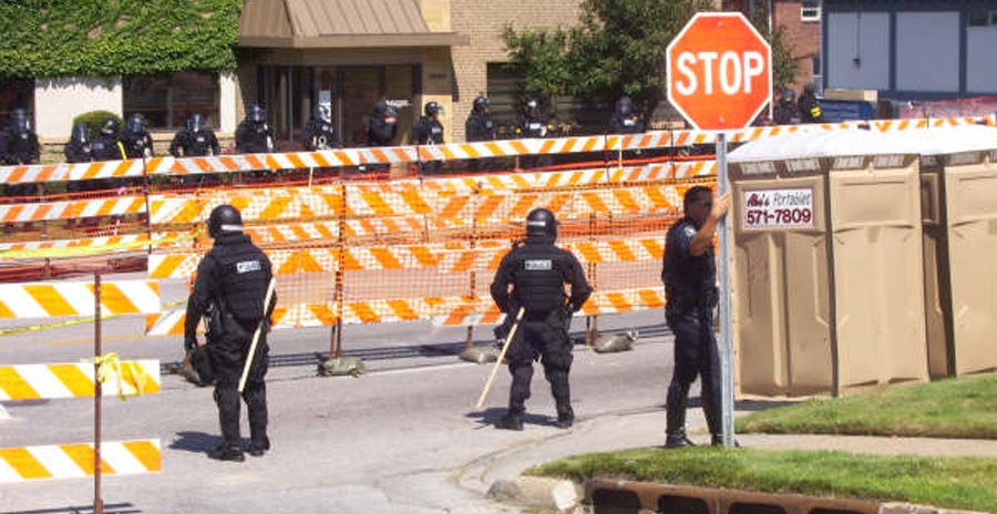 Omaha Riot Police guard Nazi sympathisers in  containment "pen" Sep 1 2007